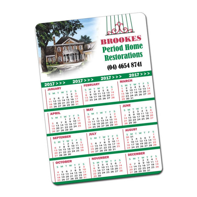A magnetic calendar featuring a house illustration, coloured with green and red elements, displaying the months and days of 2017.