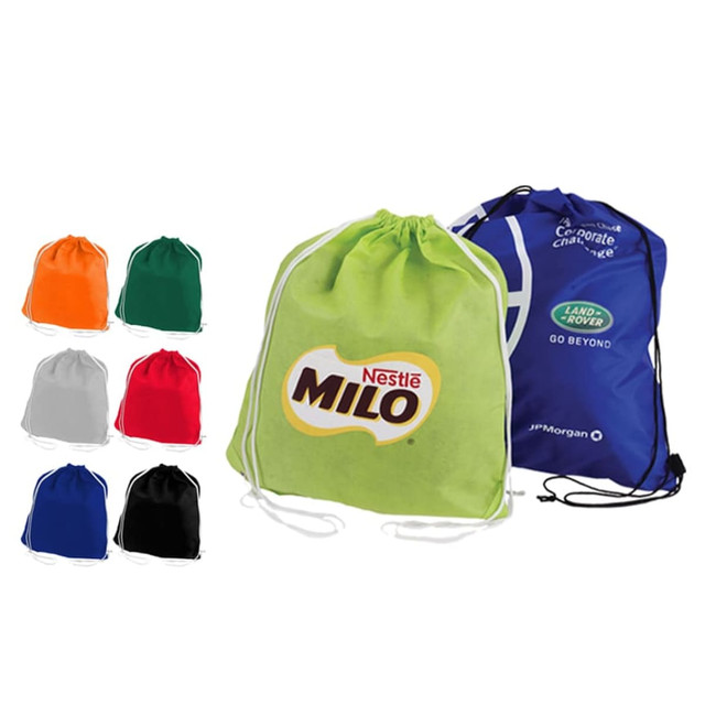 A collection of non-woven drawstring bags in various colours, featuring a logo on one bag.