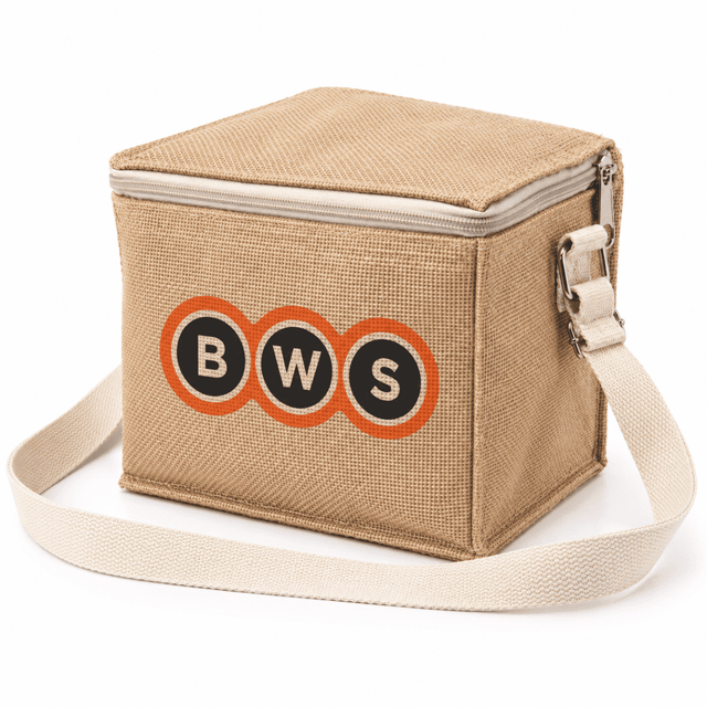 A jute cooler bag in tan with a shoulder strap and a logo on the front.