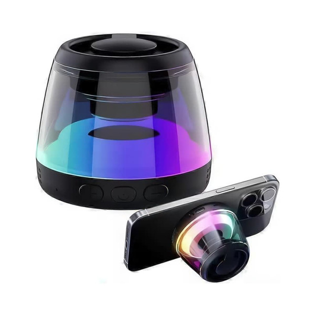 A Bluetooth speaker stand in black with a clear body displaying RGB LED lights and a smartphone placed next to it.