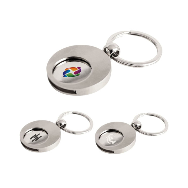 A metallic round trolley coin keyring featuring multiple designs, with a keyring loop attached.
