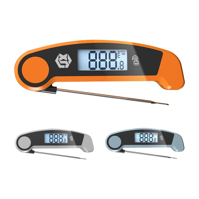 A digital instant read meat thermometer in orange, grey, and blue, featuring a large display and stainless steel probe.