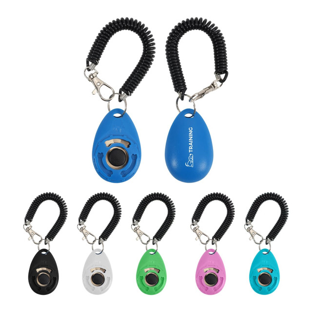 A training clicker in various colours including blue, black, white, green, and pink, with a coiled lanyard for attachment.