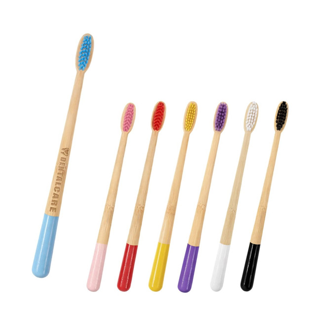 A set of large conical handle colourful toothbrushes in various hues, including pink, yellow, purple, and black, with a branding logo.
