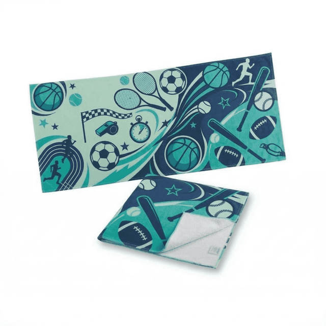 A sports-themed towel featuring a mix of blue and teal colours with various sporting icons and a logo. Measuring 85 x 40 cm.