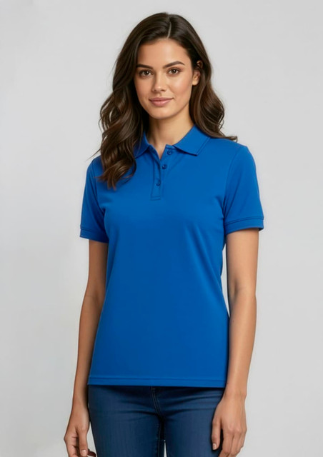 A woman stands wearing a blue women's sprint short sleeve polo shirt with a collar and logo.