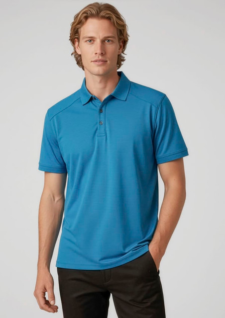 A men's short sleeve polo shirt in bright blue, featuring a collar and a logo. Styled with black pants.