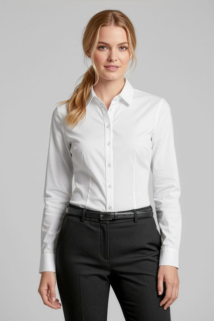 A white women's button-up long sleeve shirt with a fitted style, accompanied by a model wearing tailored black pants.