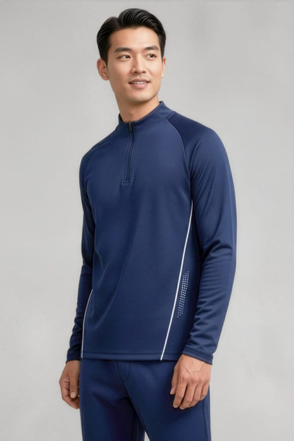 A mid-layer top in navy blue with long sleeves and a quarter-zip collar, featuring a logo on the side.
