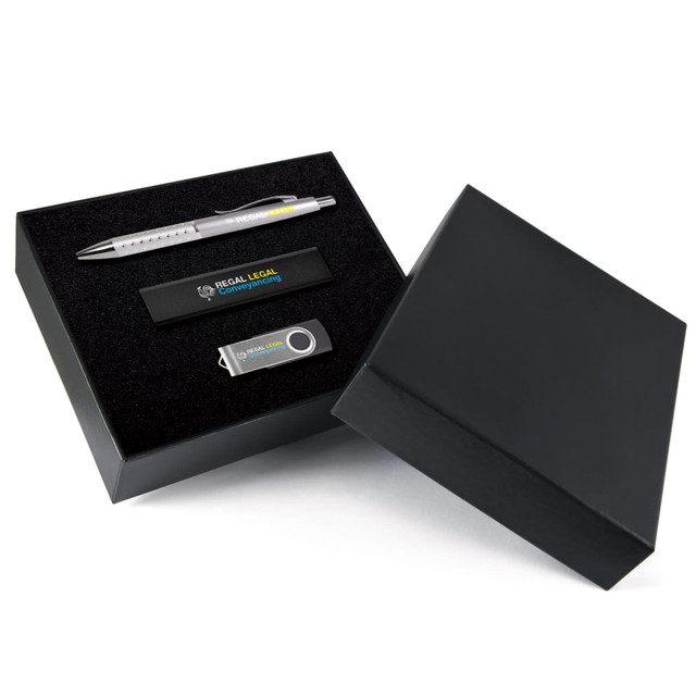 A black gift set containing a silver pen, a USB drive, and a black flash drive, presented in a sleek box. A black gift set containing a silver pen, a USB drive, and a black flash drive, presented in a sleek box.