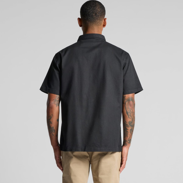 A black short-sleeve button-up shirt with a collared neck, featuring a logo on the back.