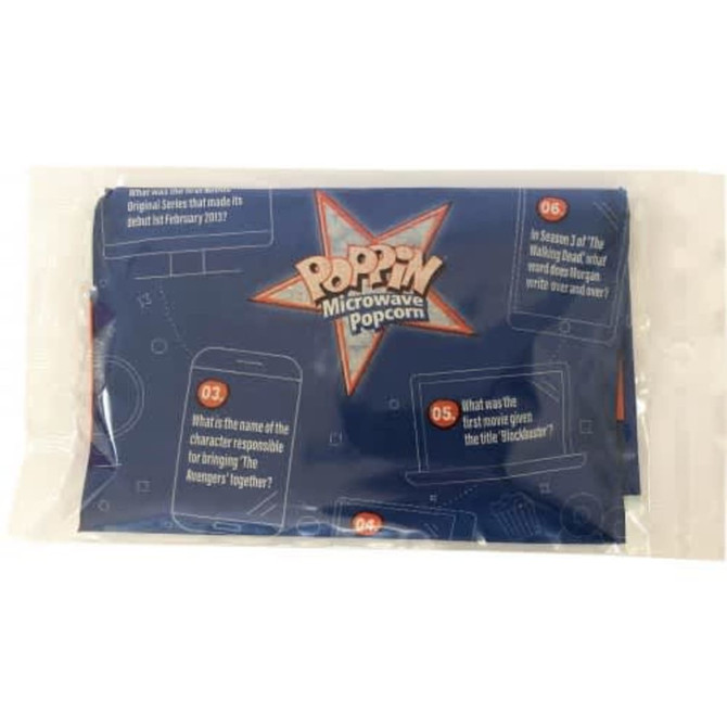 A blue packet of microwave popcorn, featuring a star design and a logo, sealed in plastic wrapping.