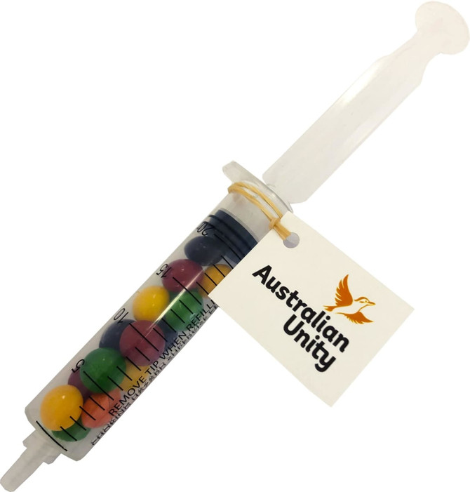 Syringe filled with Skittles 20g