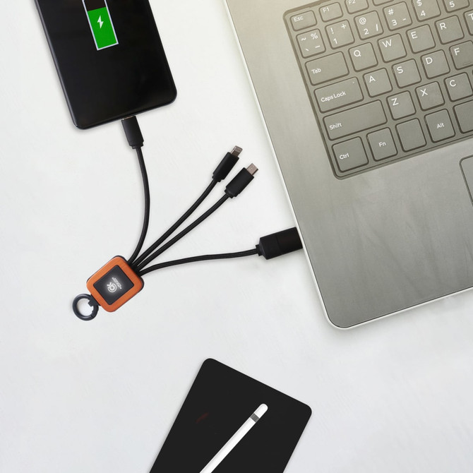 A square-shaped light-up charging cable with multiple connectors in orange, connected to a laptop and a smartphone.