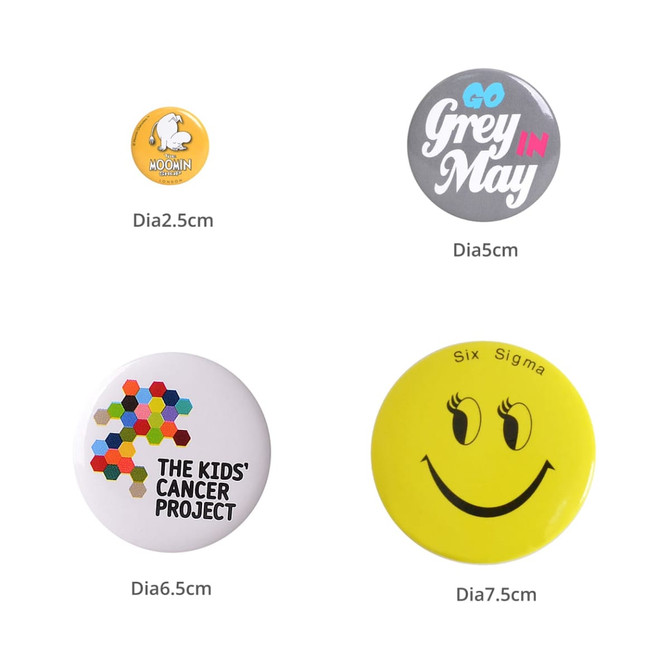 Four button badges in various designs and colours, including yellow, grey, and a colourful hexagon pattern.