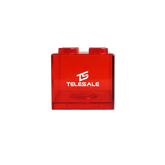 A red square block coin bank with two rounded tops and a logo on the front.