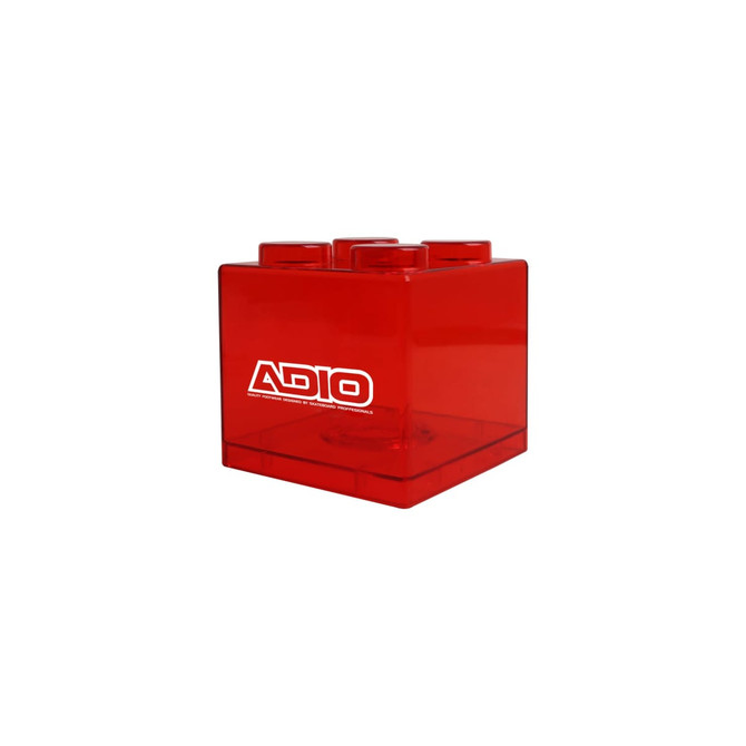 A red square block coin bank with a logo, featuring a distinct block shape.