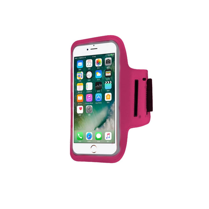 A pink cell phone arm band holding a smartphone, designed to secure the device during activities.