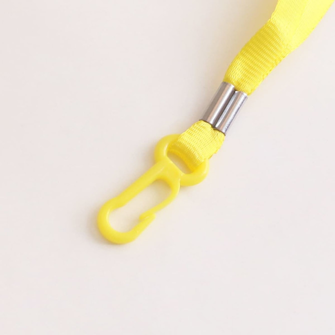 A yellow waterproof mobile pouch featuring a clip attachment and a vibrant strap for easy carrying.