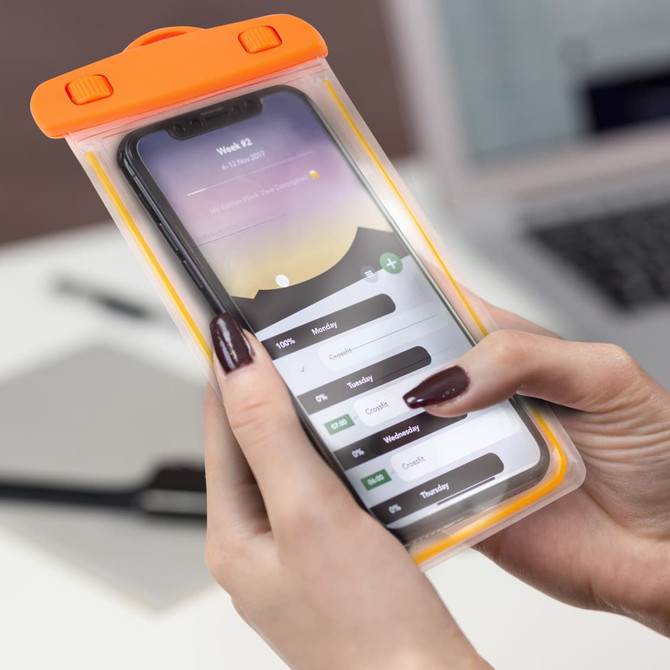 A waterproof phone bag in bright orange, securely holding a smartphone with a visible screen interface.