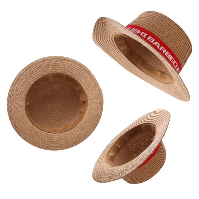A straw hat in light brown with a red ribbon band and an interior view, featuring a logo.