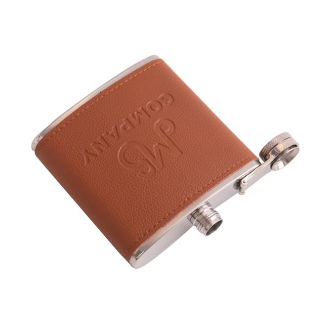 A drink bottle in brown leather with a stainless steel cap and a logo on the side.