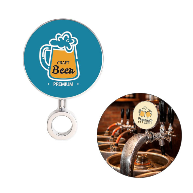 A circular beer tap badge featuring a stylised beer mug design in blue and white, attached to a silver fixture.