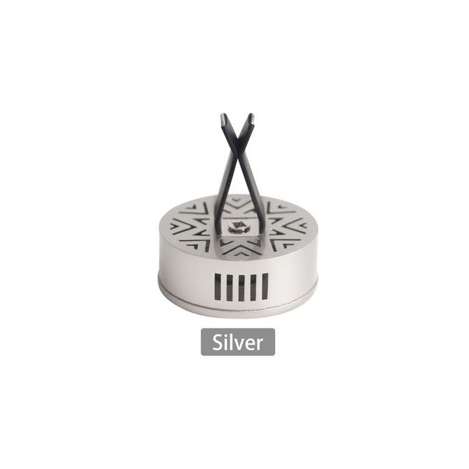 A silver car clip air freshener with a geometric design and black accents. Features a logo on the base.