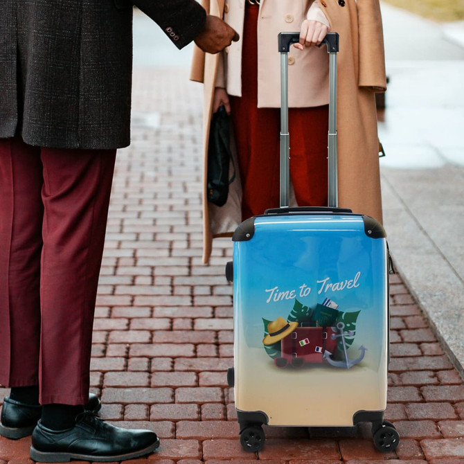A wheeled suitcase featuring a colourful design with a gradient from blue to sandy yellow and a logo.