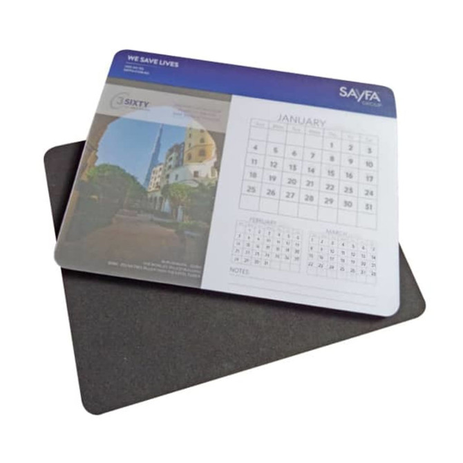 A calendar mouse mat featuring a scenic image and a monthly calendar layout in blue and grey tones.