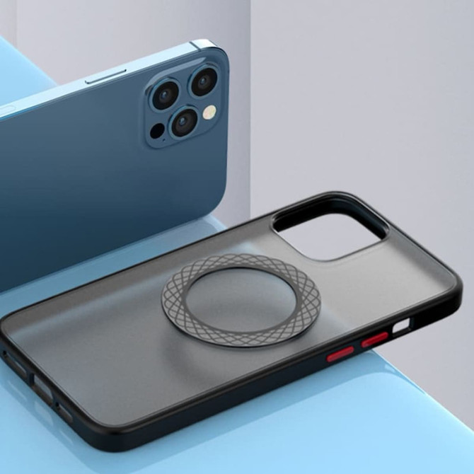 A black phone case with a textured magnetic ring, placed beside a blue smartphone on a light blue surface.