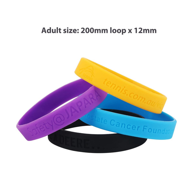 A collection of debossed silicone wristbands in purple, yellow, and black stacked together, featuring various logos.