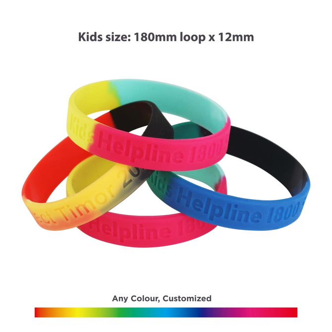 Four silicon wristbands in vibrant colours: pink, blue, green, and black, featuring a logo. Kids' size displayed.