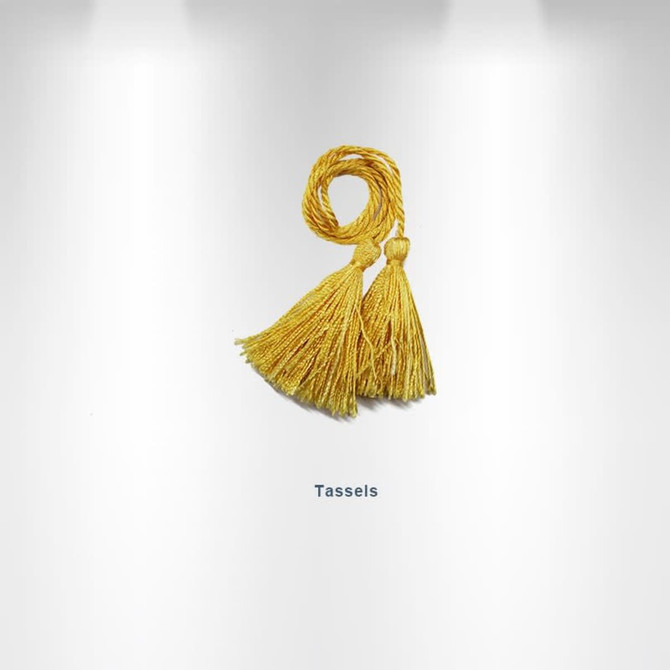 Two yellow tassels are neatly tied together, featuring long, frayed ends. The image has a simple background and a logo.