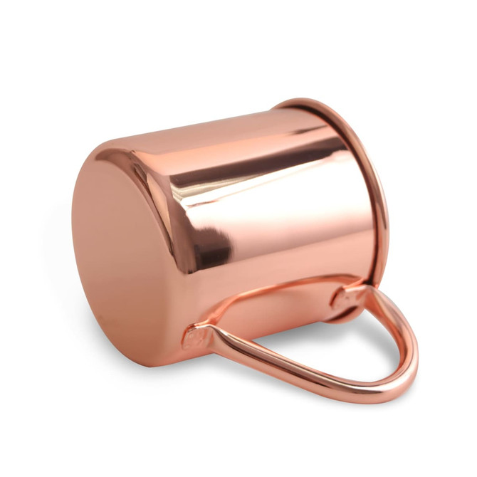 A copper Moscow Mule mug with a polished finish and a sturdy handle, featuring a round base.