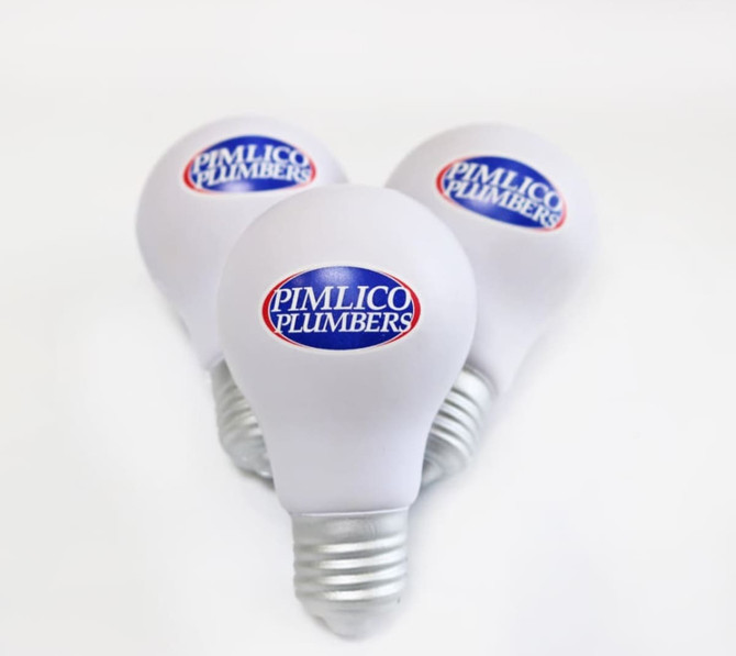 Bulb-shaped stress relievers in white with a silver base, featuring a logo on the front.