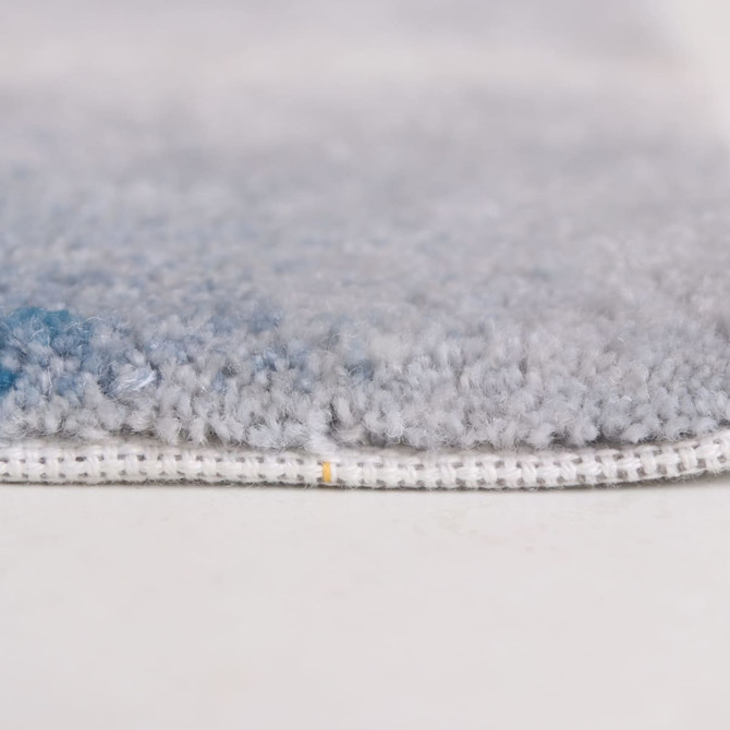Acrylic fibre logo mat with a soft, textured surface in shades of grey and blue, featuring a stitched edge.