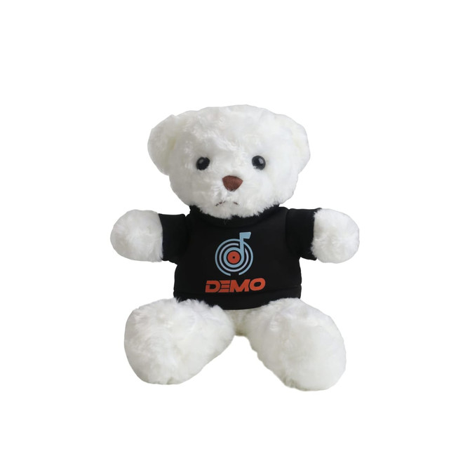 A white bear plush toy wearing a black T-shirt with a logo. The toy has round eyes and a cute expression.