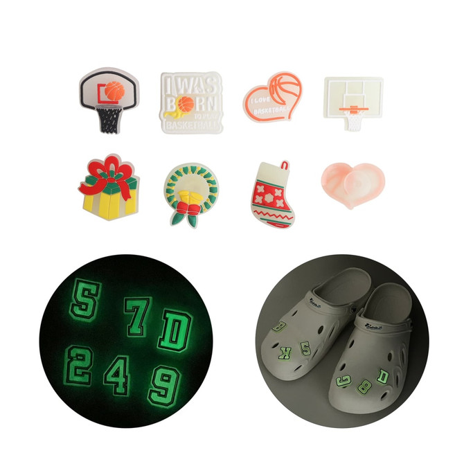 A variety of novelty shoe charms featuring basketball, gifts, and holiday themes, with glowing numbers and a pair of white clogs.