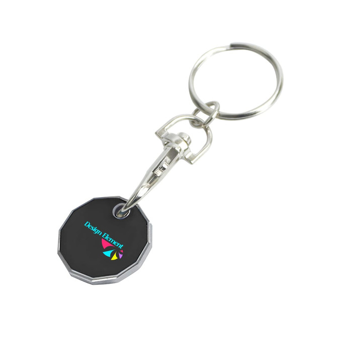 A silver keyring with a round, black trolley coin featuring a logo.