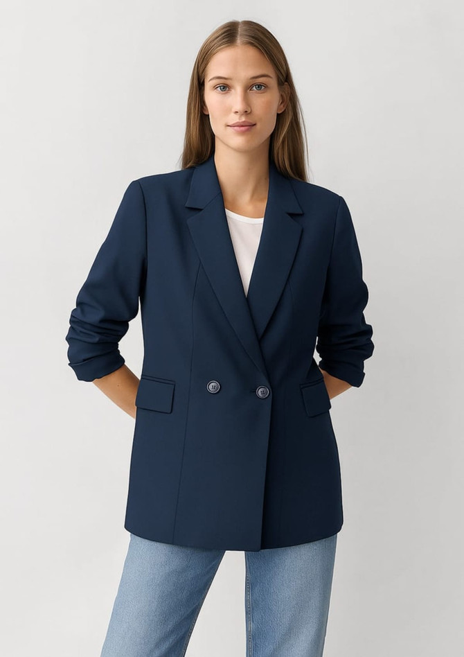 A navy blue double-breasted longline jacket with a classic fit and full sleeves. Features two front buttons and pockets.