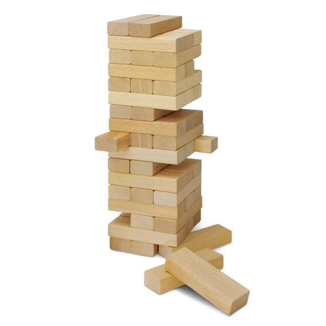 A stack of wooden blocks in varying sizes, resembling a game of Tumbling Tower, with some blocks lying beside the tower.