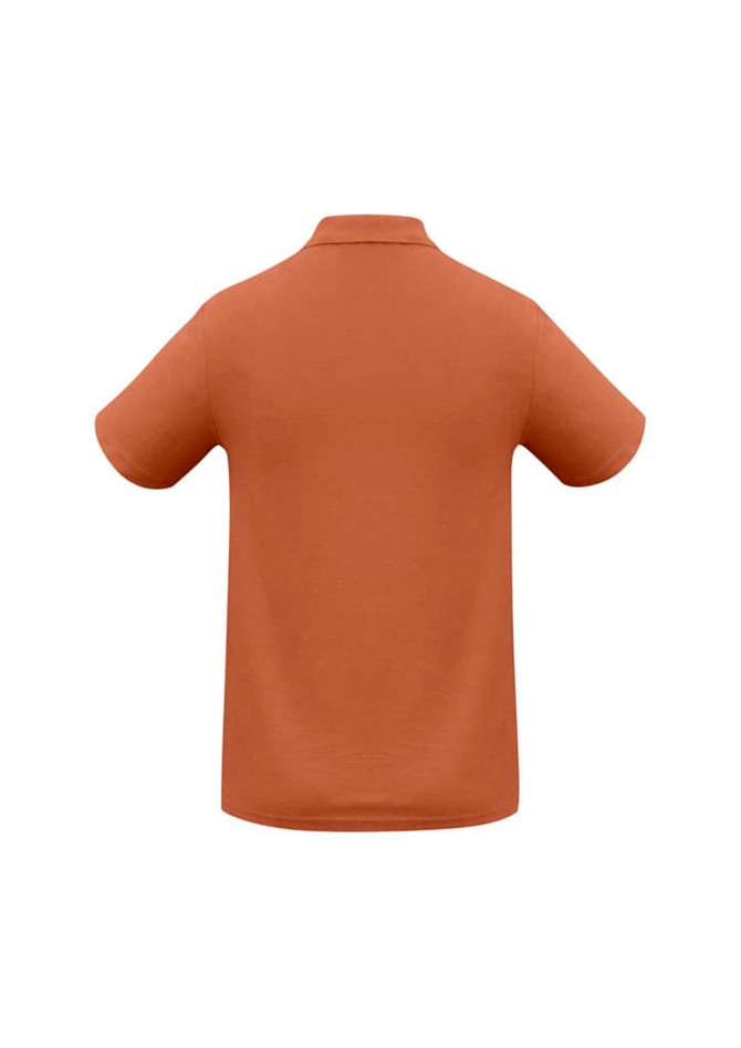 A men's polo shirt in a warm terracotta colour, featuring short sleeves and a collar. Includes a logo.