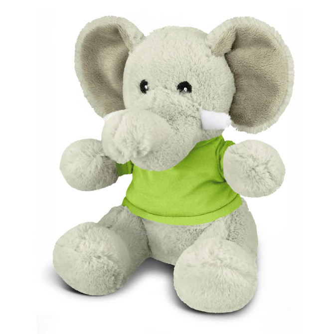 A plush toy elephant in light grey, wearing a green shirt, with soft ears and a smiling face. It has a logo on the shirt.