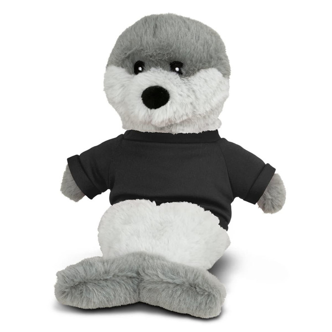 A plush seal toy with grey and white fur wearing a black shirt, featuring a logo on the shirt.