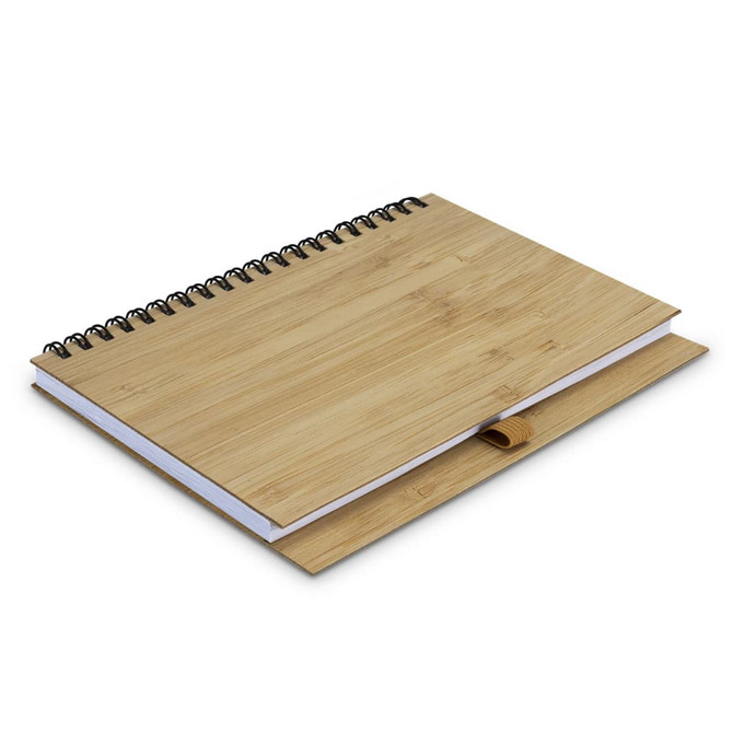 A medium bamboo notebook with a spiral binding and a wooden pen holder, featuring a natural bamboo finish.