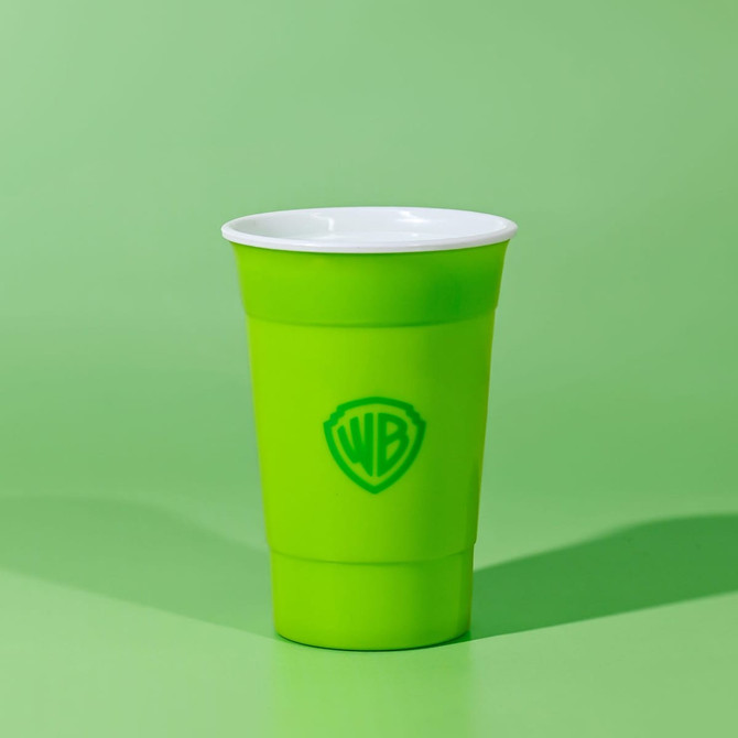 A double wall party cup in bright green with a white interior, featuring a logo on the front.