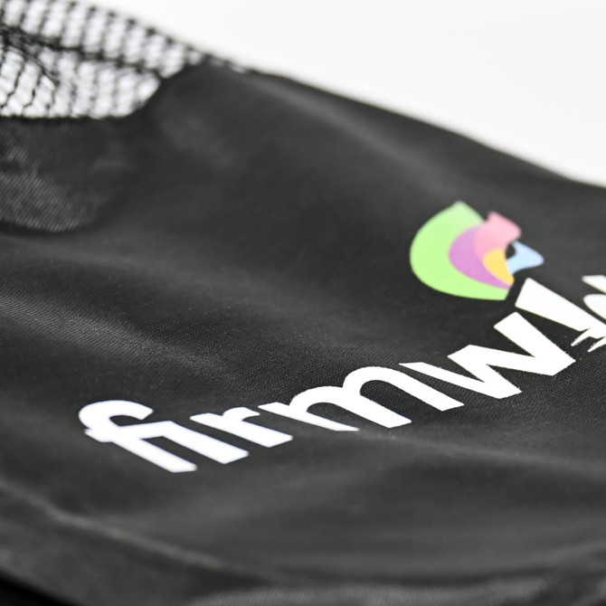 A black sports bag with a mesh overlay and logo detailing, ideal for carrying sports gear.