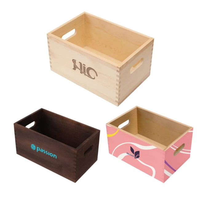 Three wooden storage boxes in natural, dark brown, and pink colours, each featuring different designs and logos.