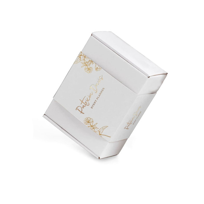 A white packaging sleeve with floral designs and a logo, designed for custom packaging solutions.